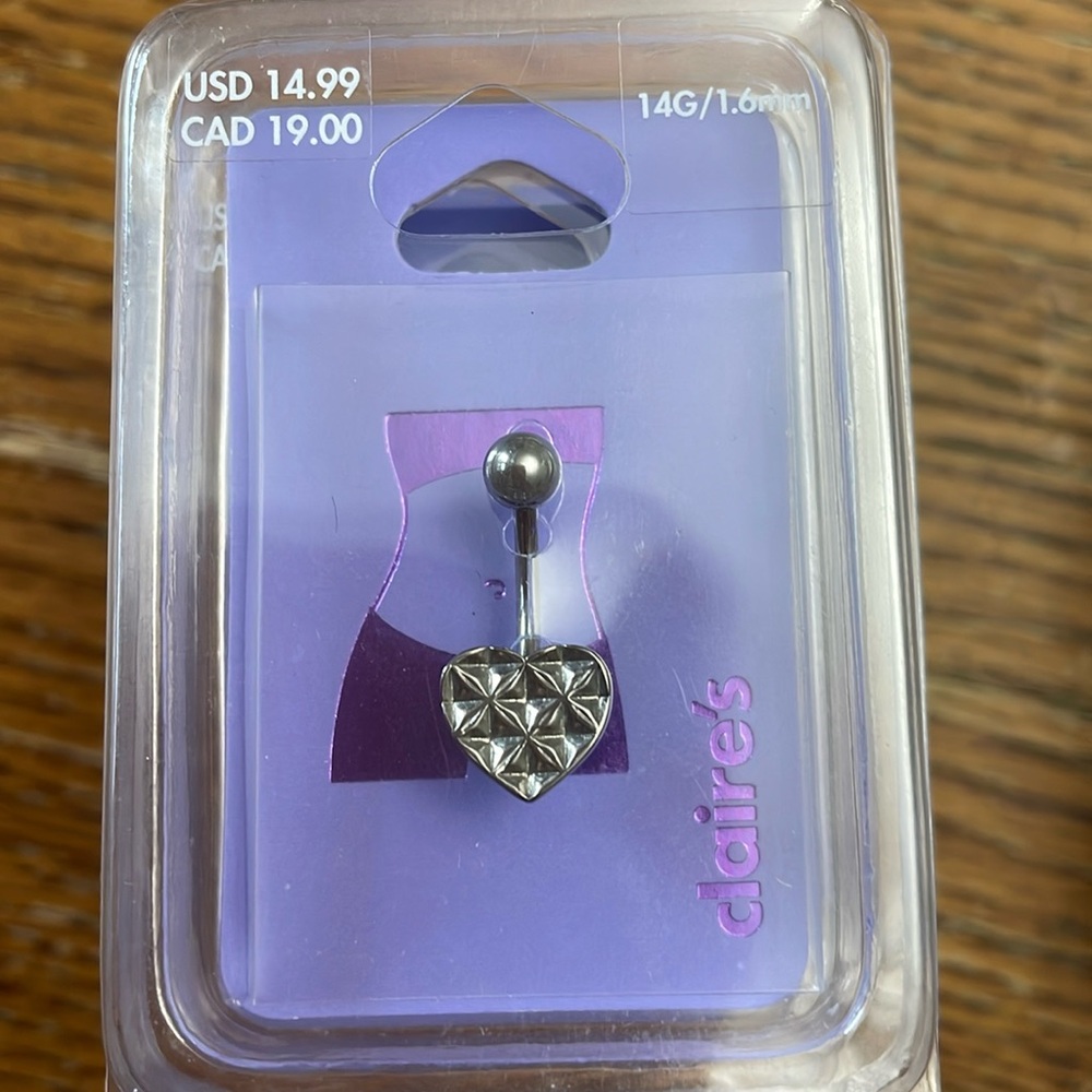 Belly button ring, new.
